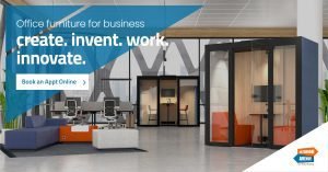 Open Plan Office with Lounge seating, desks, and Phone booths.